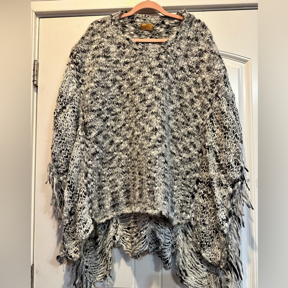 NWOT. POL brand knitted poncho. Size large.
